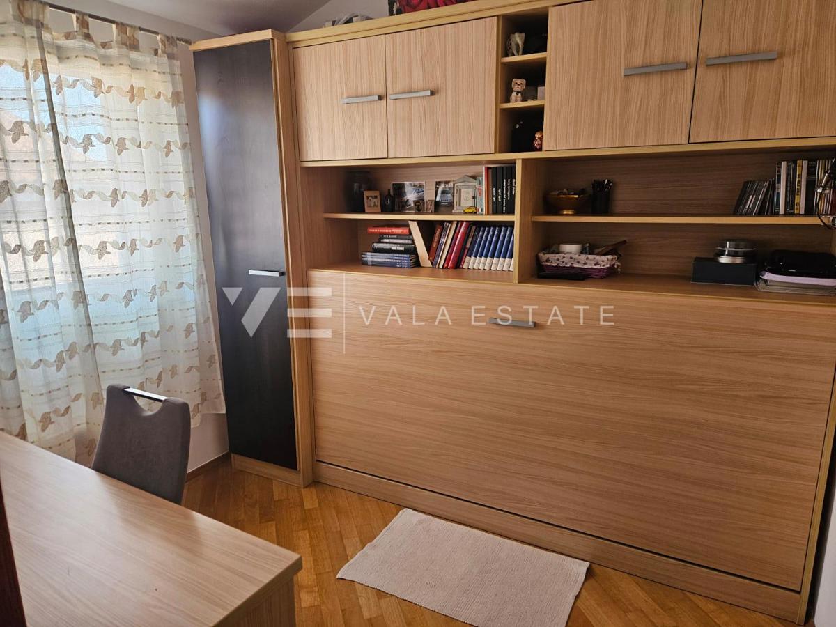 APPARTAMENTO ARREDATO CON GIARDINO IN POSIZIONE TRANQUILLA