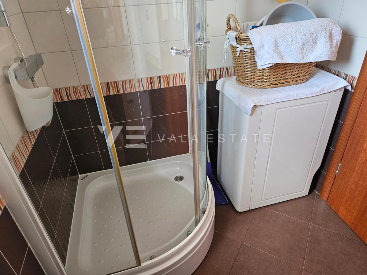 APPARTAMENTO ARREDATO CON GIARDINO IN POSIZIONE TRANQUILLA