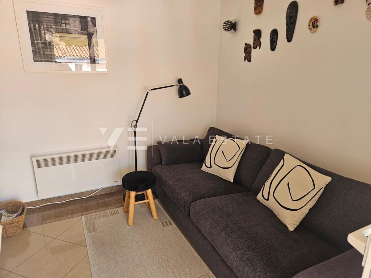 APPARTAMENTO ARREDATO CON GIARDINO IN POSIZIONE TRANQUILLA