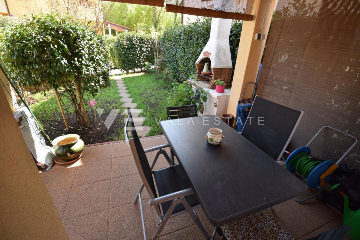 APPARTAMENTO ARREDATO CON GIARDINO IN POSIZIONE TRANQUILLA