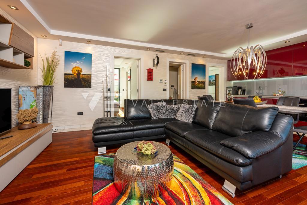 APPARTAMENTO DI LUSSO CON GIARDINO IN POSIZIONE ATTRAENTE