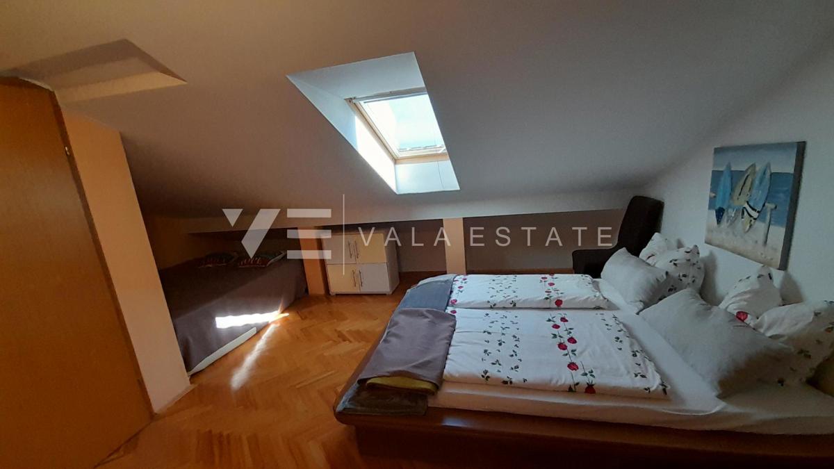 APPARTAMENTO SU DUE PIANI CON VISTA MARE