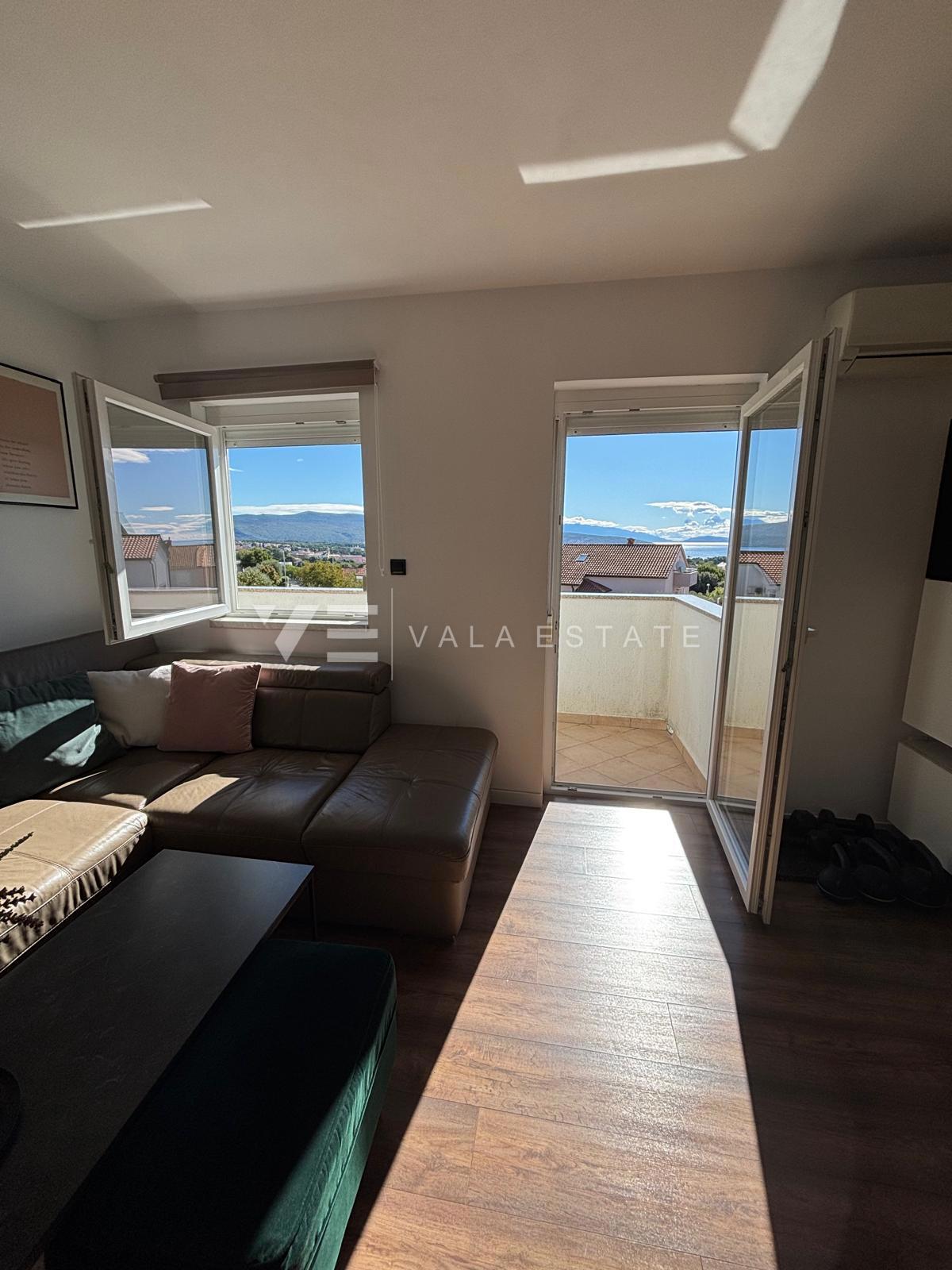 APPARTAMENTO MODERNO SU DUE LIVELLI CON VISTA MARE