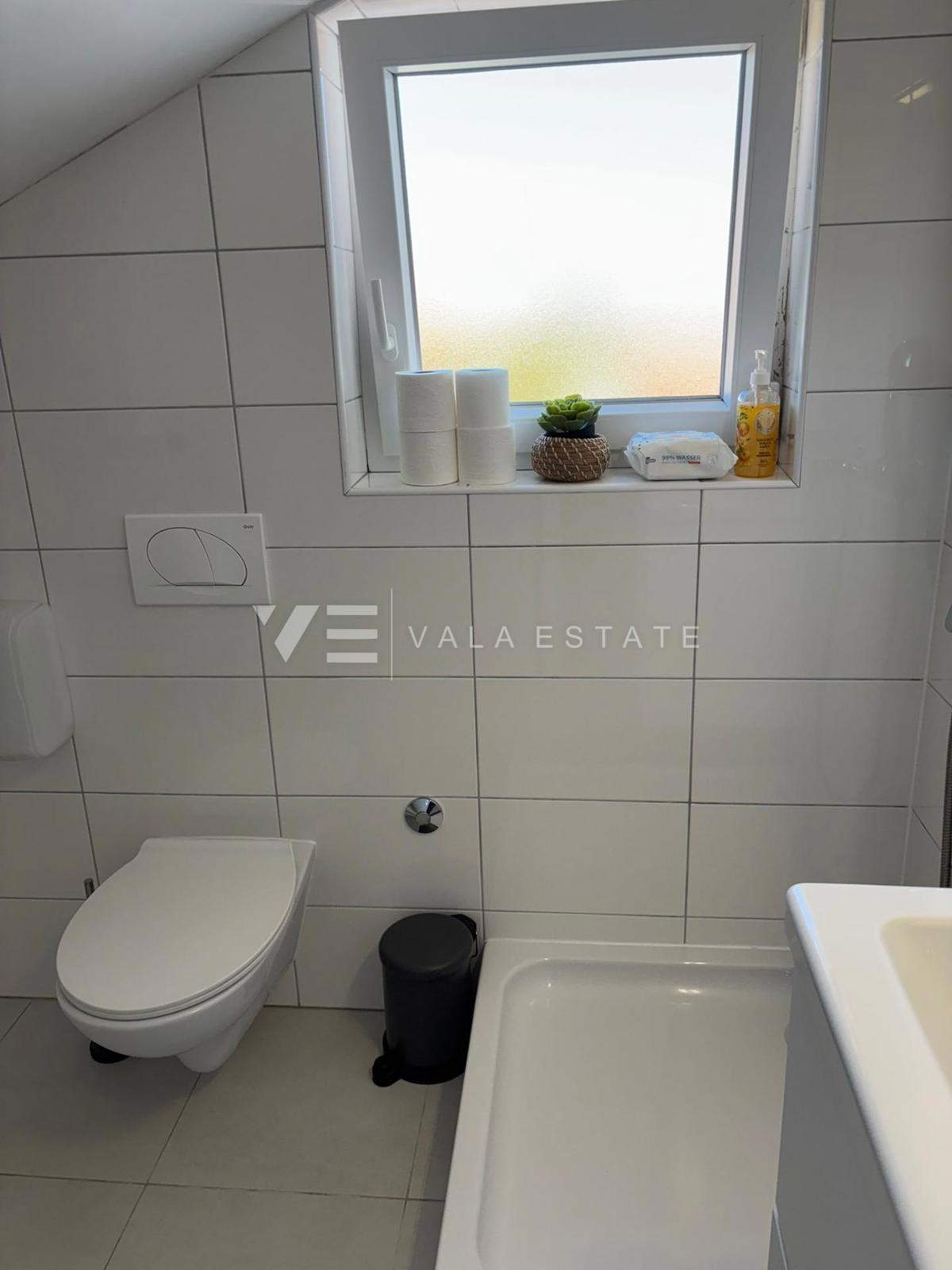 APPARTAMENTO MODERNO SU DUE LIVELLI CON VISTA MARE