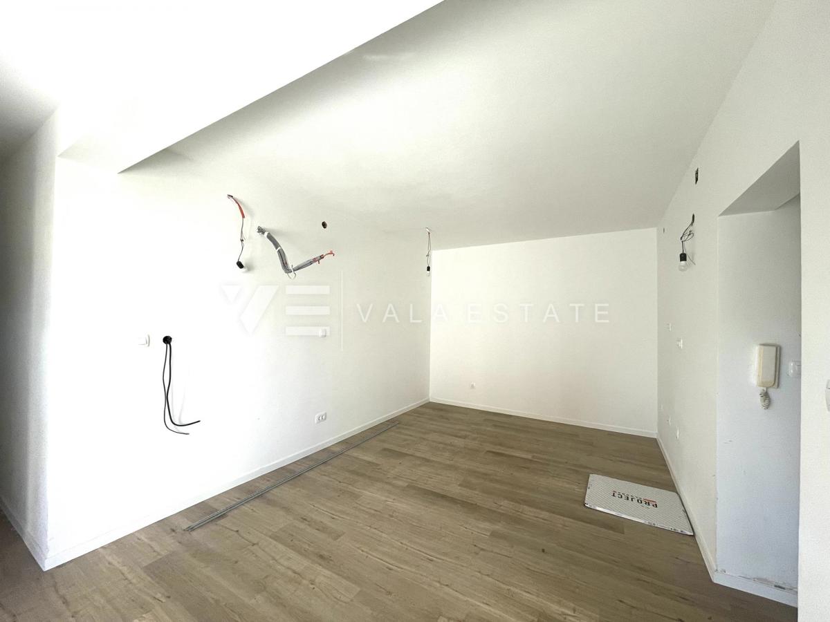 APPARTAMENTO AL PIANO TERRA ALTO DI UN PALAZZO RISTRUTTURATO IN POSIZIONE TRANQUILLA