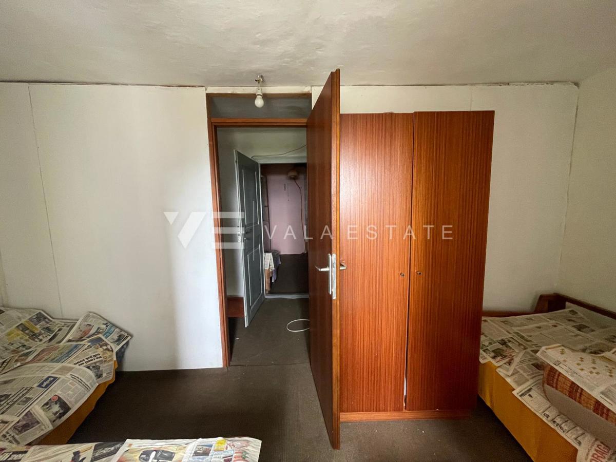 CASA A SCHIERA IN PIETRA DA RISTRUTTURARE IN POSIZIONE TRANQUILLA