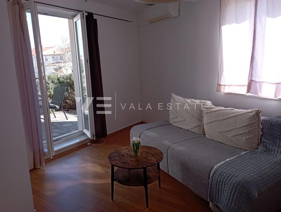 APPARTAMENTO AL PIANO TERRA CON VISTA GIARDINO E MARE