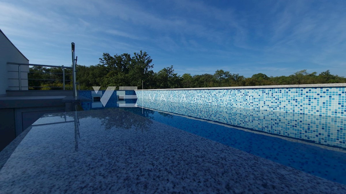 ATTICO CON VISTA MARE APERTA E PISCINA