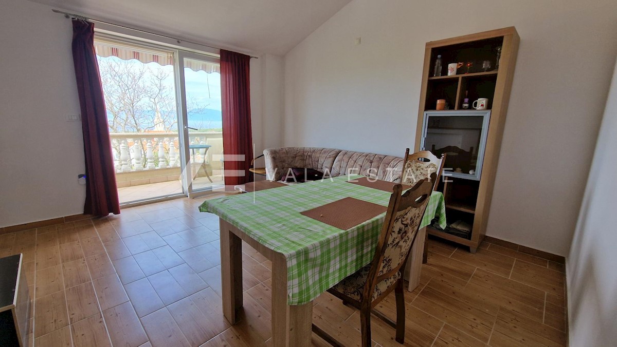 CASA A SCHIERA CON DUE APPARTAMENTI E VISTA MARE