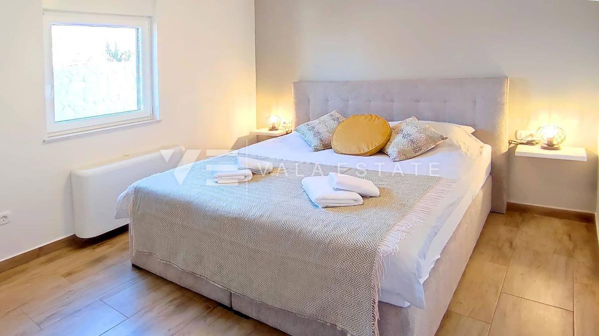 NUOVO MODERNO CONDOMINIO IN POSIZIONE TRANQUILLA CON VISTA MARE