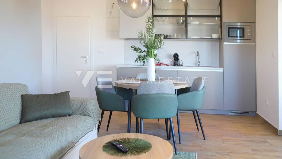 NUOVO MODERNO CONDOMINIO IN POSIZIONE TRANQUILLA CON VISTA MARE