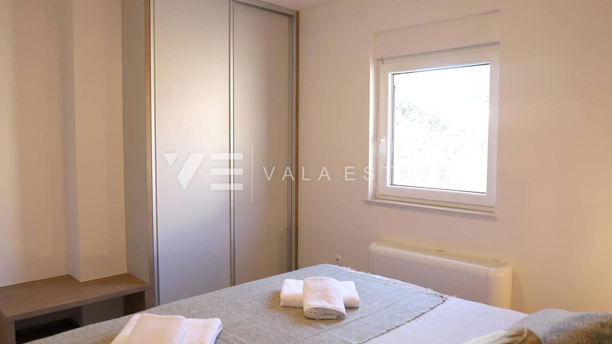 NUOVO MODERNO CONDOMINIO IN POSIZIONE TRANQUILLA CON VISTA MARE