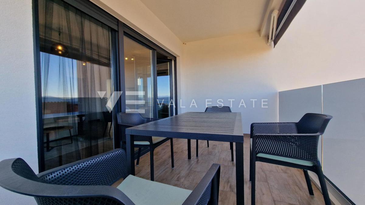 NUOVO MODERNO CONDOMINIO IN POSIZIONE TRANQUILLA CON VISTA MARE