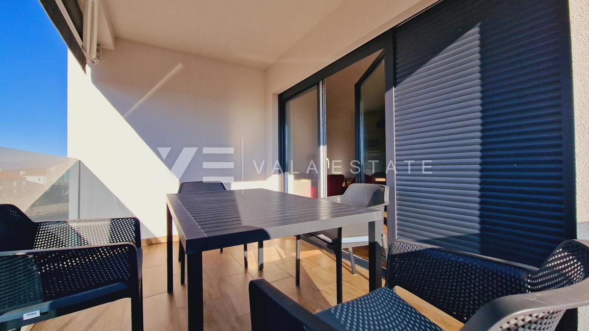 NUOVO MODERNO CONDOMINIO IN POSIZIONE TRANQUILLA CON VISTA MARE