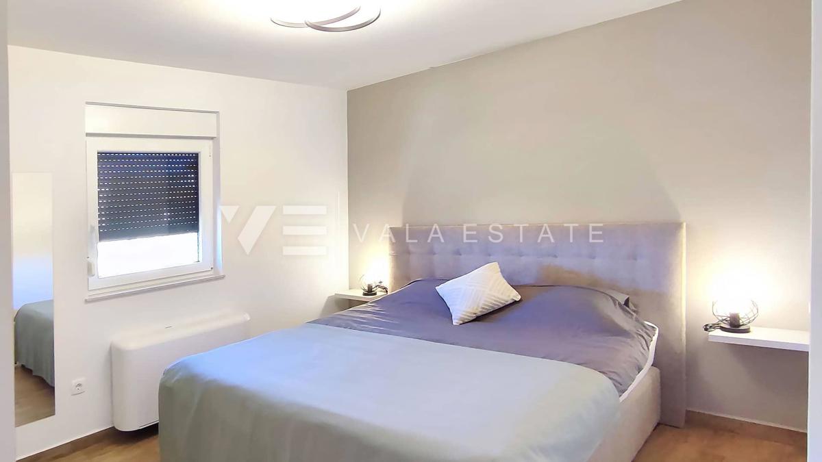 NUOVO MODERNO CONDOMINIO IN POSIZIONE TRANQUILLA CON VISTA MARE