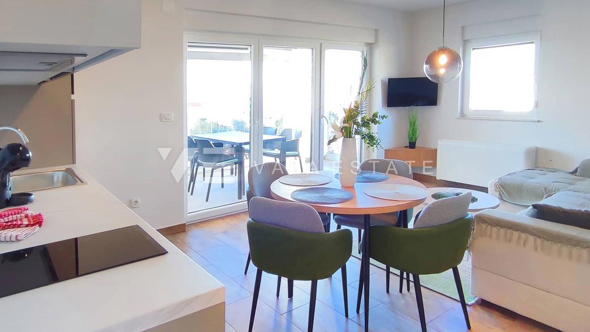 NUOVO MODERNO CONDOMINIO IN POSIZIONE TRANQUILLA CON VISTA MARE