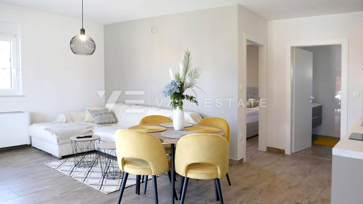 NUOVO MODERNO CONDOMINIO IN POSIZIONE TRANQUILLA CON VISTA MARE