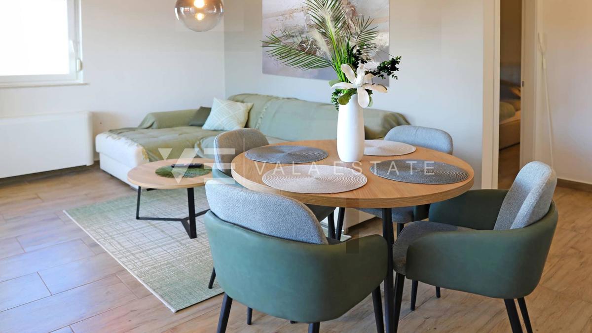 NUOVO MODERNO CONDOMINIO IN POSIZIONE TRANQUILLA CON VISTA MARE