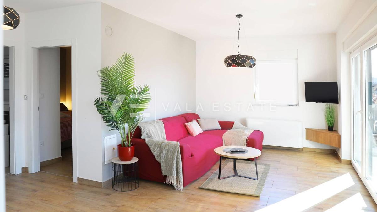 NUOVO MODERNO CONDOMINIO IN POSIZIONE TRANQUILLA CON VISTA MARE