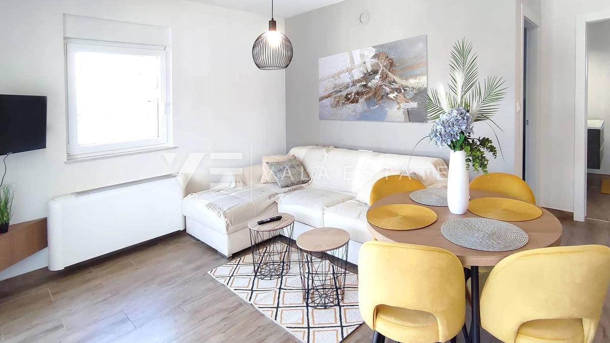 NUOVO MODERNO CONDOMINIO IN POSIZIONE TRANQUILLA CON VISTA MARE