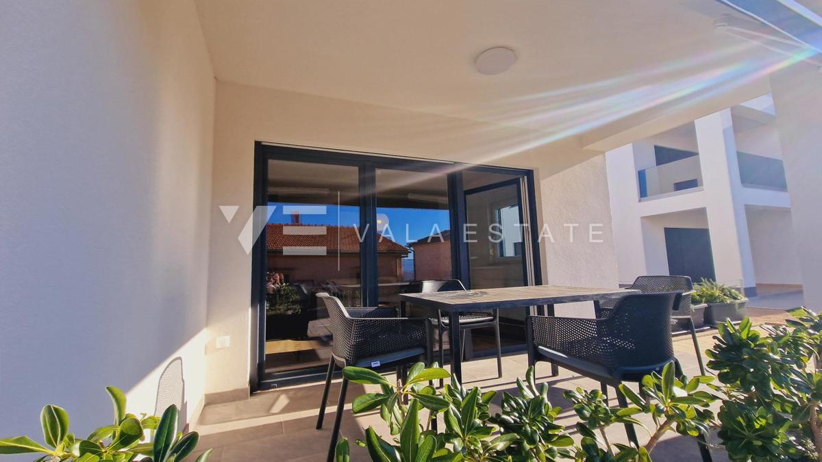 NUOVO MODERNO CONDOMINIO IN POSIZIONE TRANQUILLA CON VISTA MARE