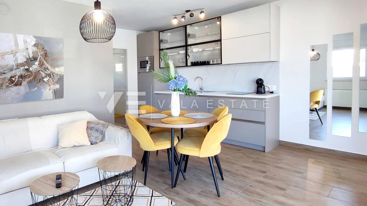 NUOVO MODERNO CONDOMINIO IN POSIZIONE TRANQUILLA CON VISTA MARE