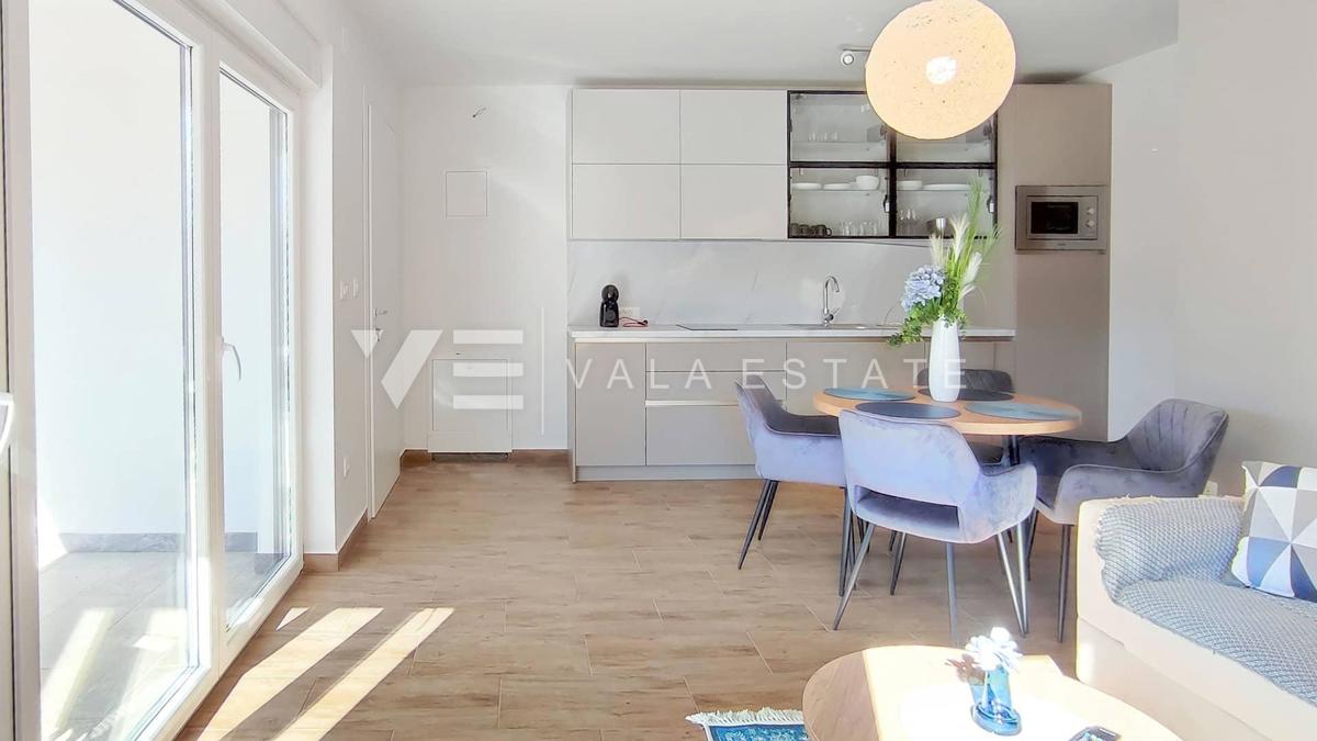 NUOVO MODERNO CONDOMINIO IN POSIZIONE TRANQUILLA CON VISTA MARE