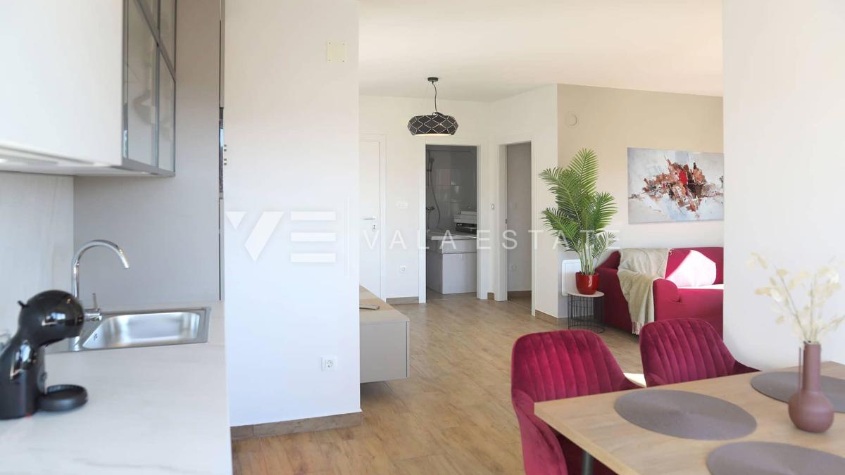 NUOVO MODERNO CONDOMINIO IN POSIZIONE TRANQUILLA CON VISTA MARE