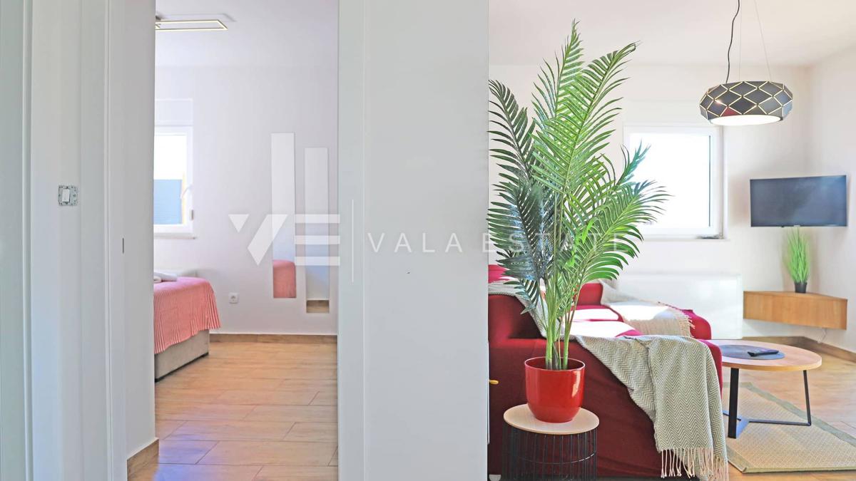 NUOVO MODERNO CONDOMINIO IN POSIZIONE TRANQUILLA CON VISTA MARE