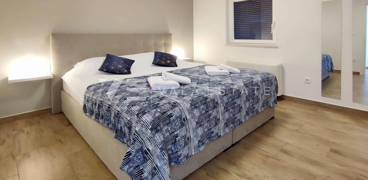 NUOVO MODERNO CONDOMINIO IN POSIZIONE TRANQUILLA CON VISTA MARE