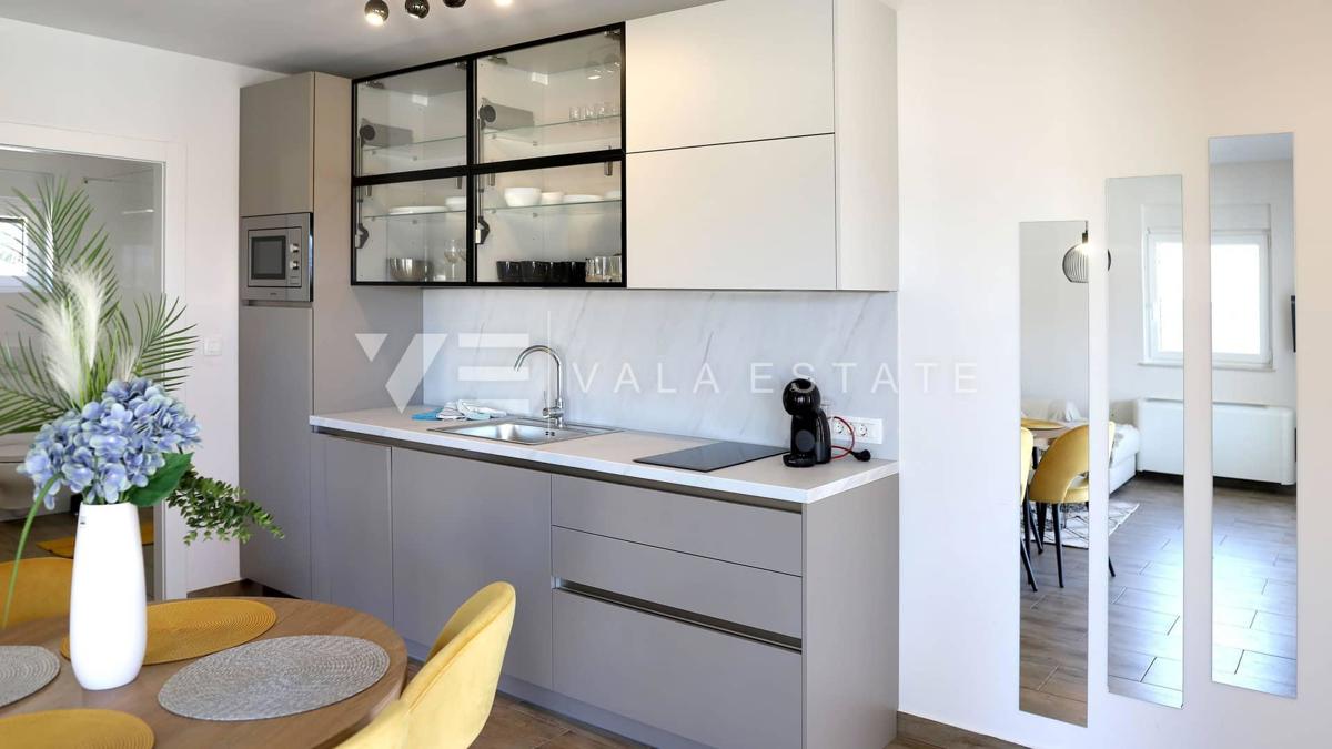 NUOVO MODERNO CONDOMINIO IN POSIZIONE TRANQUILLA CON VISTA MARE