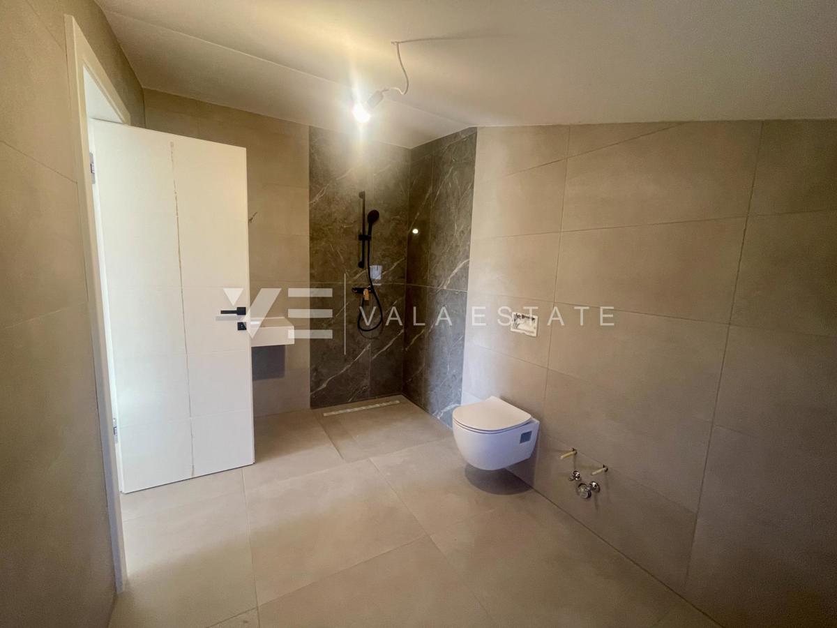 APPARTAMENTO SU DUE PIANI IN NUOVA COSTRUZIONE CON VISTA MARE