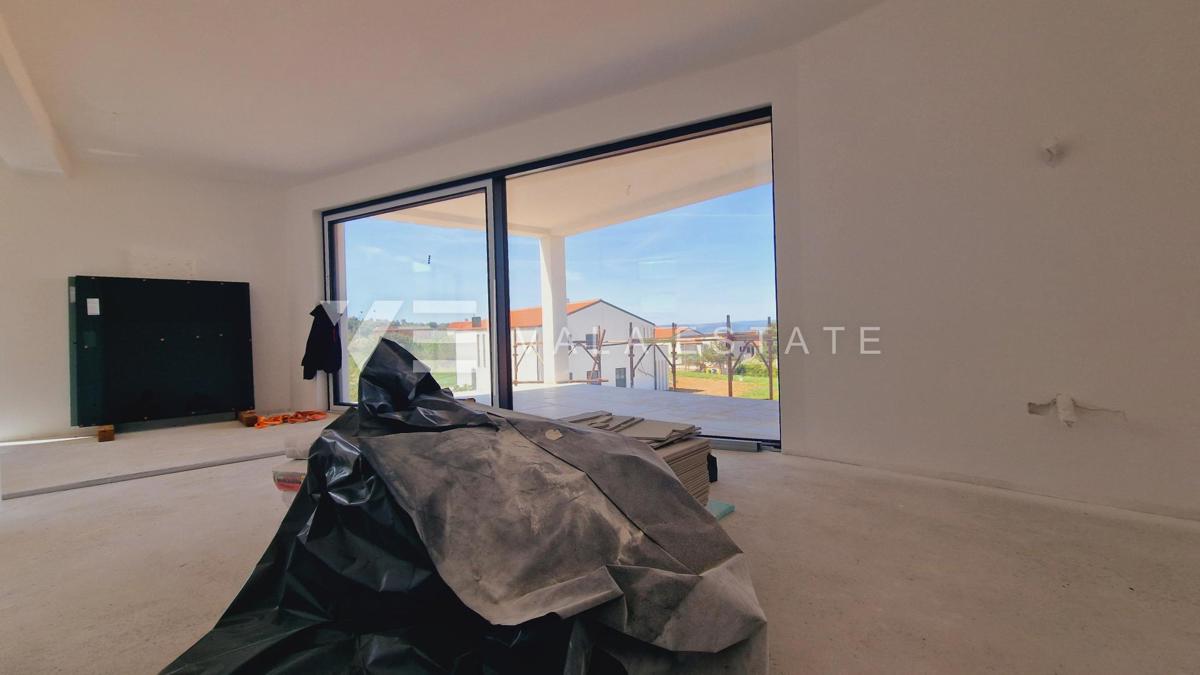 APPARTAMENTO SU DUE PIANI IN NUOVA COSTRUZIONE CON VISTA MARE