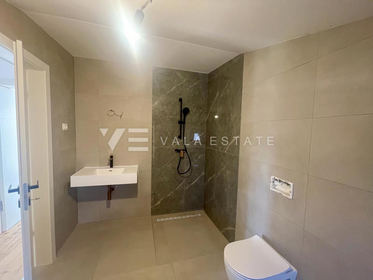 APPARTAMENTO SU DUE PIANI IN NUOVA COSTRUZIONE CON VISTA MARE