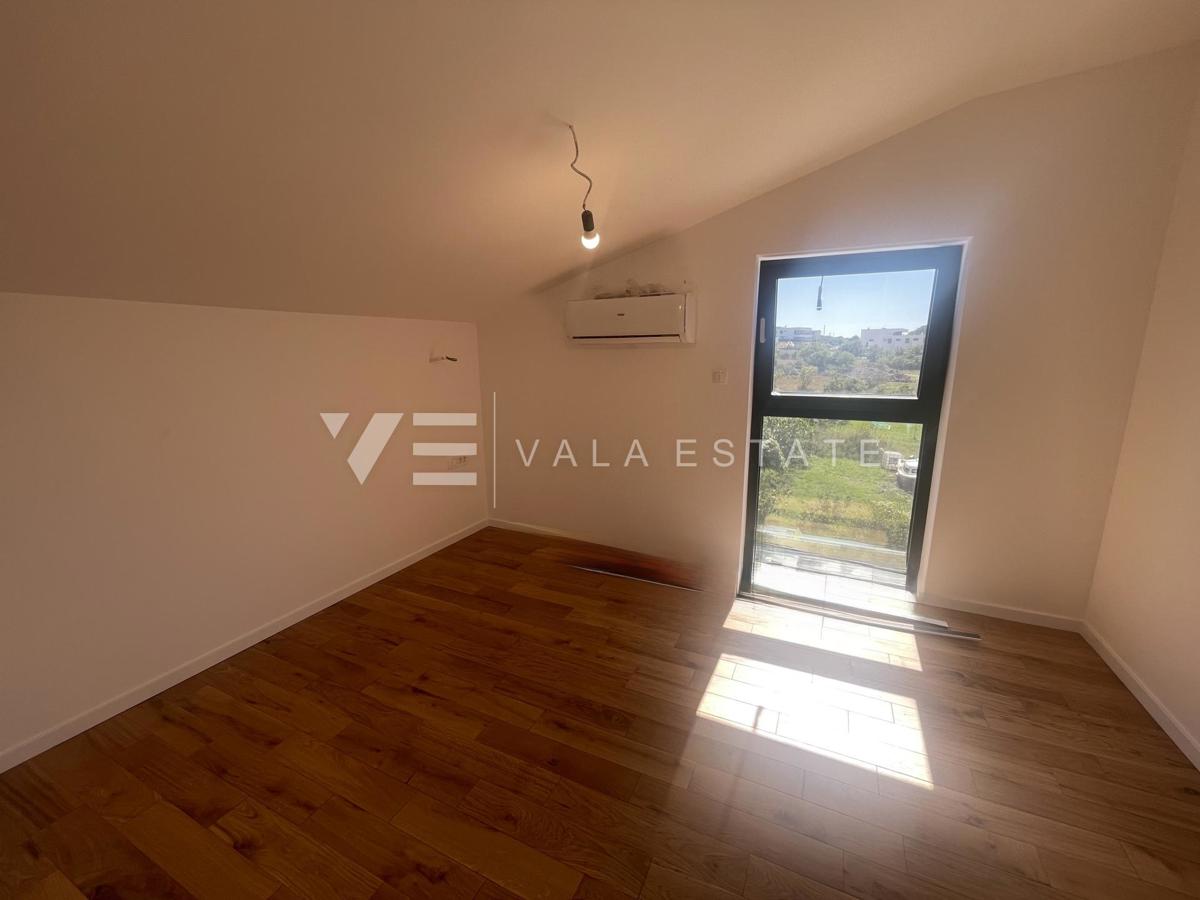 APPARTAMENTO SU DUE PIANI IN NUOVA COSTRUZIONE CON VISTA MARE