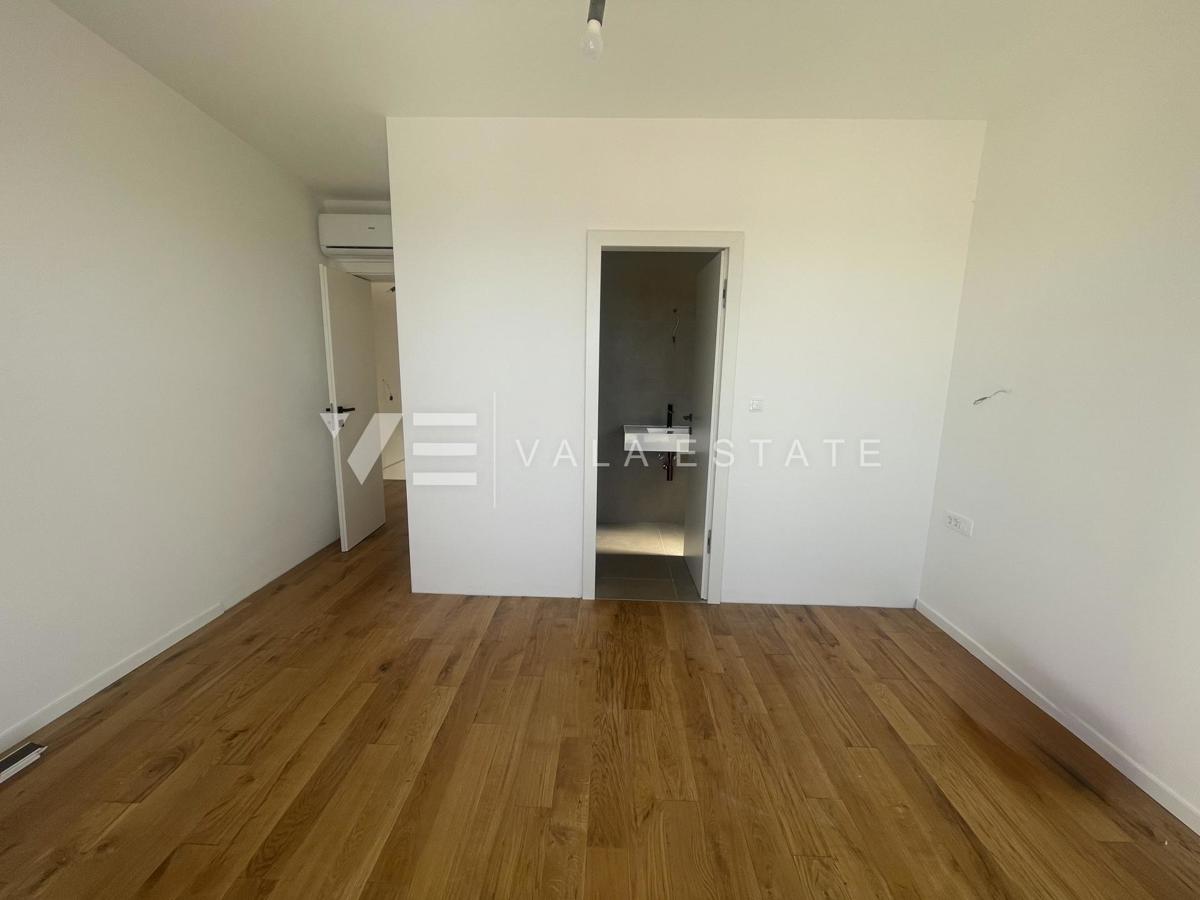 APPARTAMENTO SU DUE PIANI IN NUOVA COSTRUZIONE CON VISTA MARE