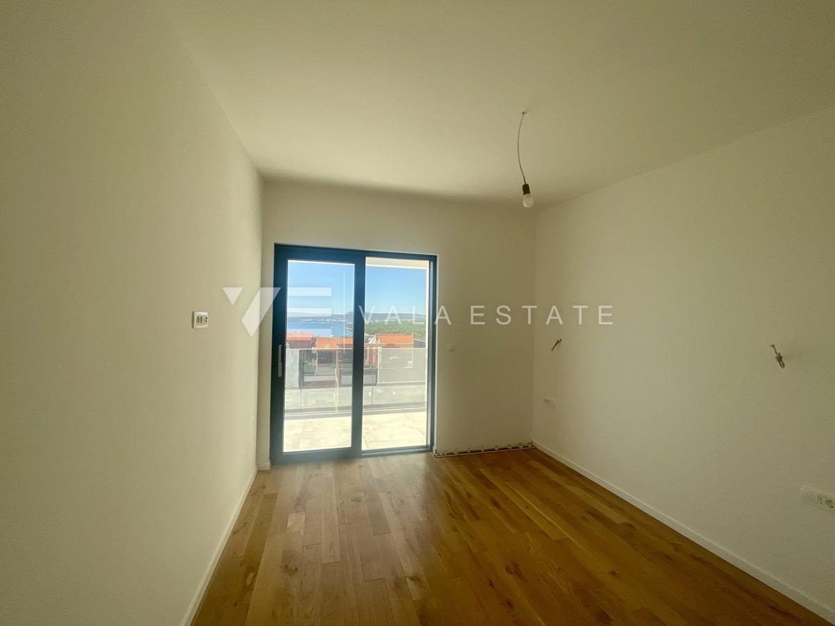 APPARTAMENTO SU DUE PIANI IN NUOVA COSTRUZIONE CON VISTA MARE