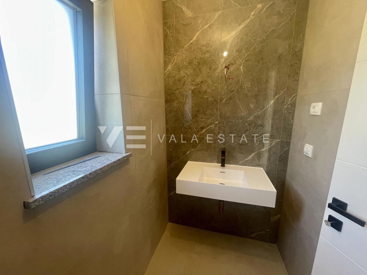 APPARTAMENTO SU DUE PIANI IN NUOVA COSTRUZIONE CON VISTA MARE