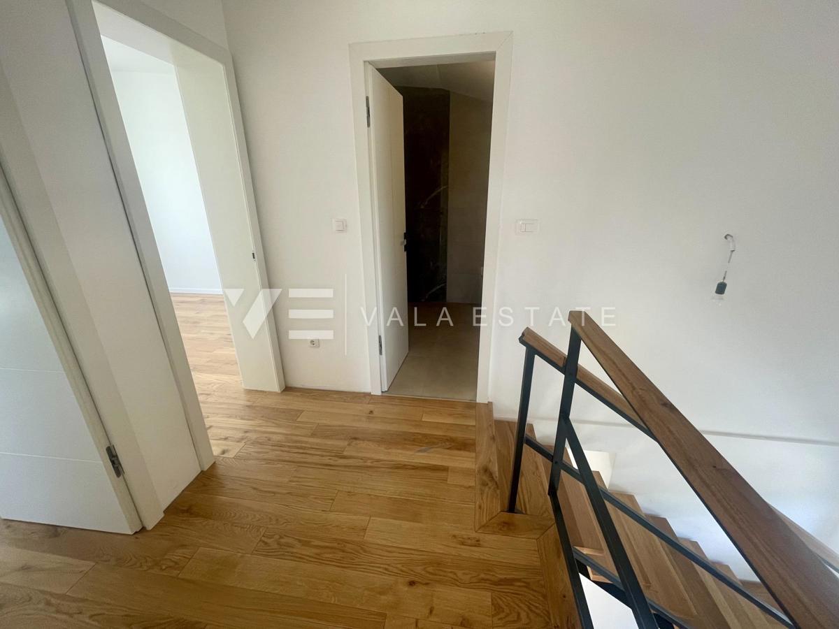 APPARTAMENTO SU DUE PIANI IN NUOVA COSTRUZIONE CON VISTA MARE