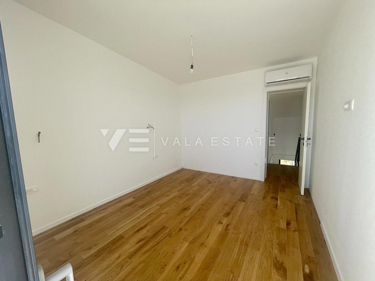 APPARTAMENTO SU DUE PIANI IN NUOVA COSTRUZIONE CON VISTA MARE