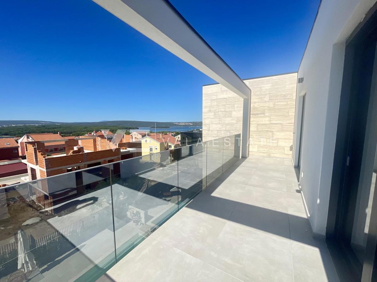 APPARTAMENTO SU DUE PIANI IN NUOVA COSTRUZIONE CON VISTA MARE