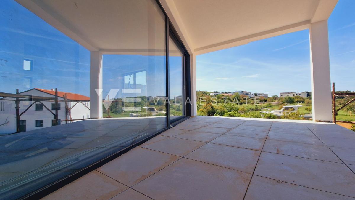 APPARTAMENTO SU DUE PIANI IN NUOVA COSTRUZIONE CON VISTA MARE