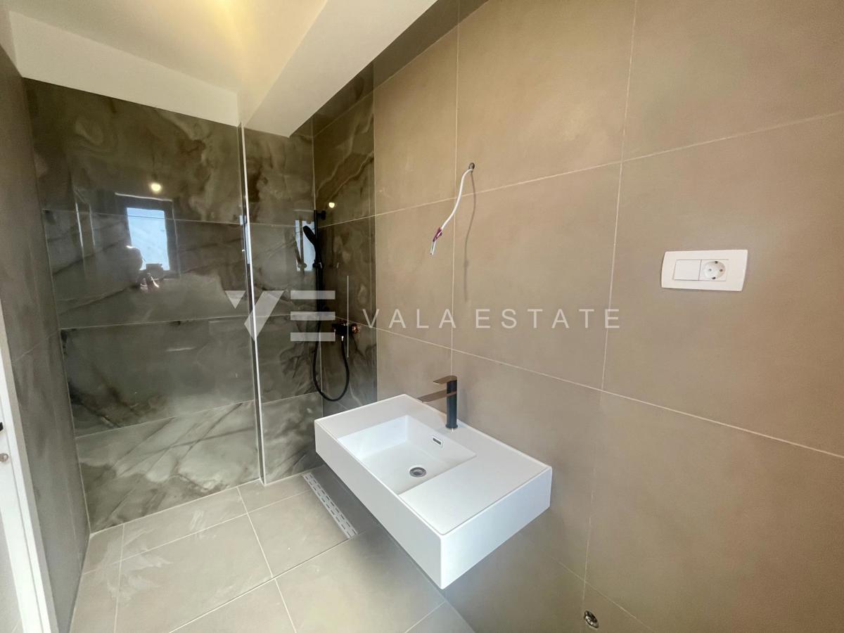 APPARTAMENTO SU DUE PIANI IN NUOVA COSTRUZIONE CON VISTA MARE