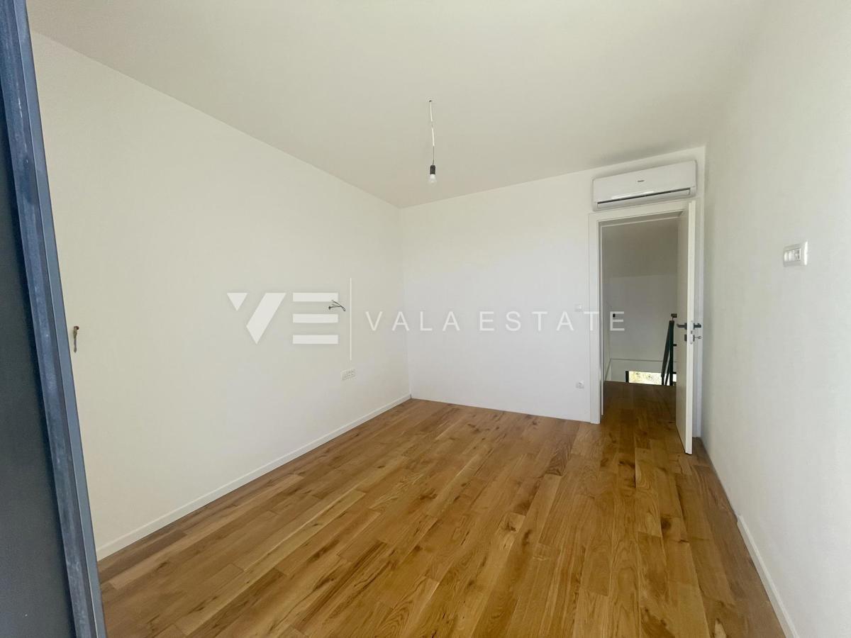 APPARTAMENTO SU DUE PIANI IN NUOVA COSTRUZIONE CON VISTA MARE