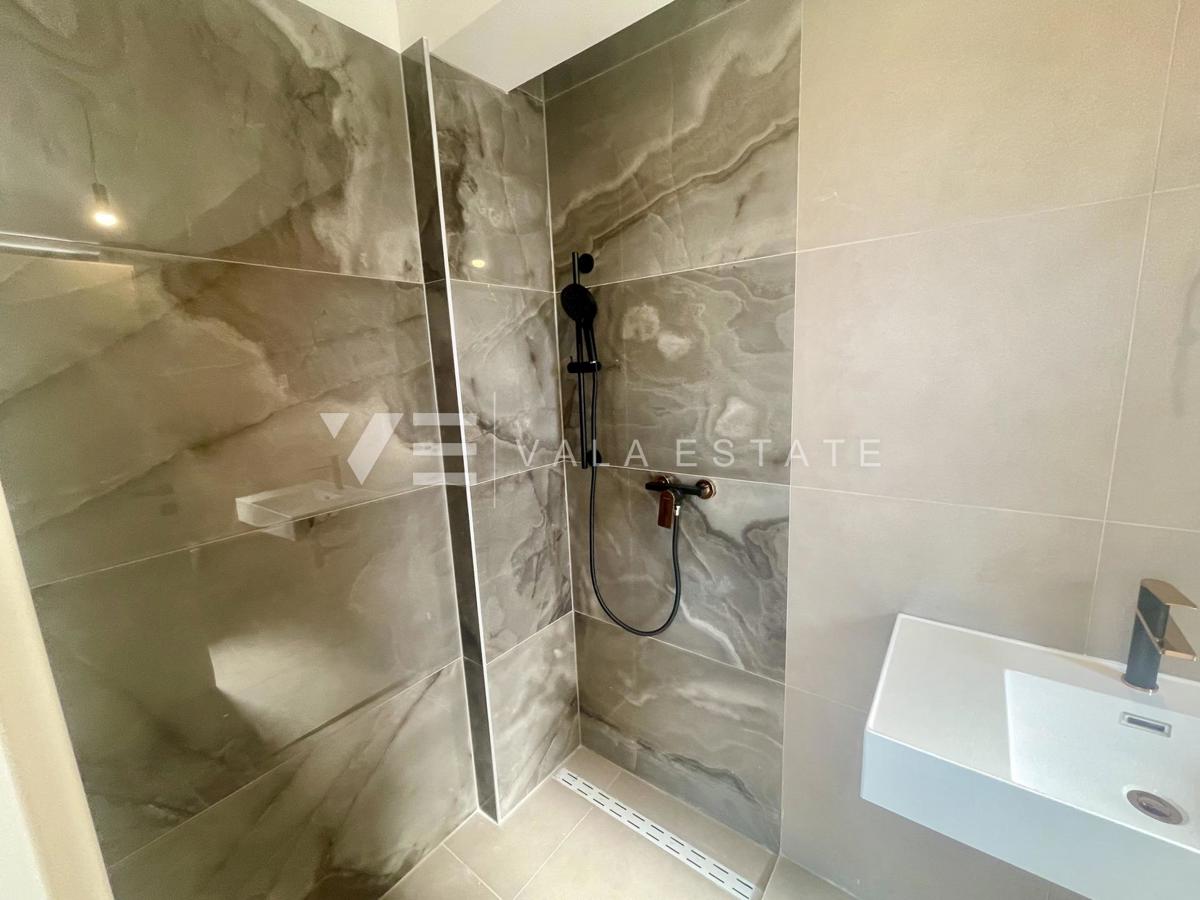 APPARTAMENTO SU DUE PIANI IN NUOVA COSTRUZIONE CON VISTA MARE