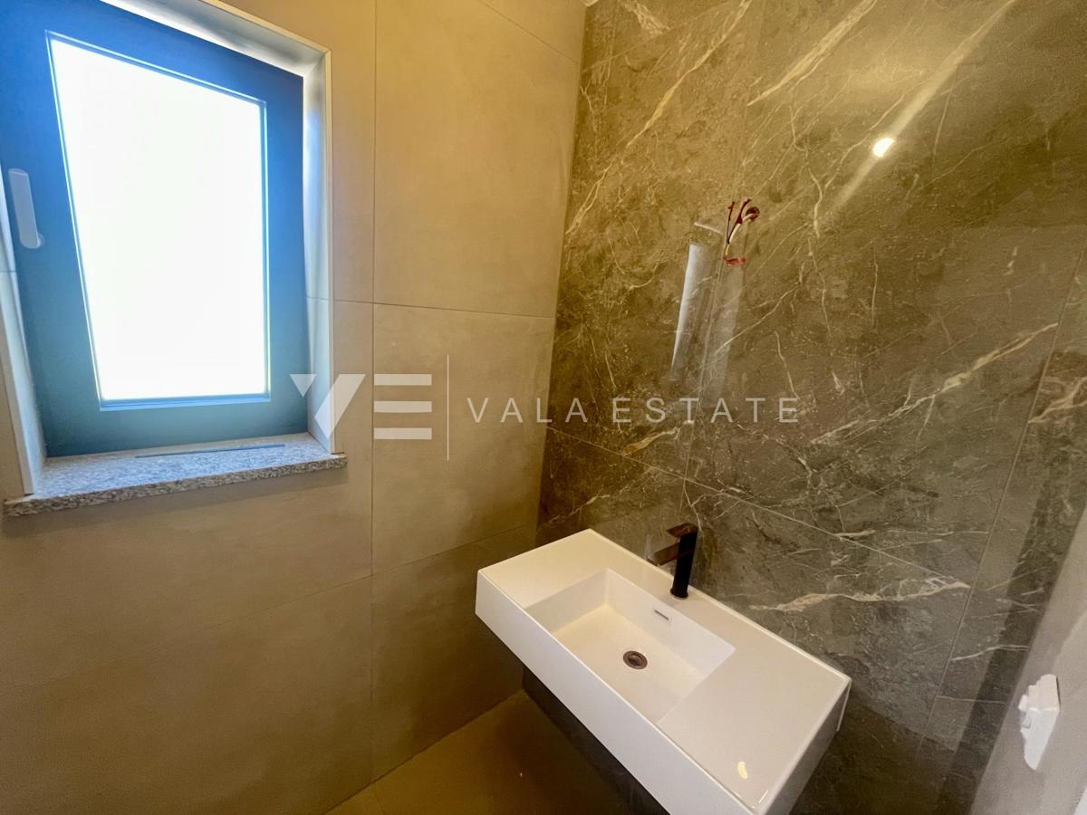 APPARTAMENTO SU DUE PIANI IN NUOVA COSTRUZIONE CON VISTA MARE