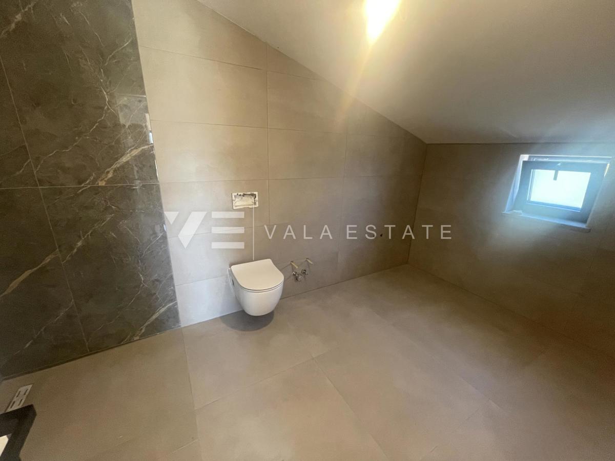 APPARTAMENTO SU DUE PIANI IN NUOVA COSTRUZIONE CON VISTA MARE