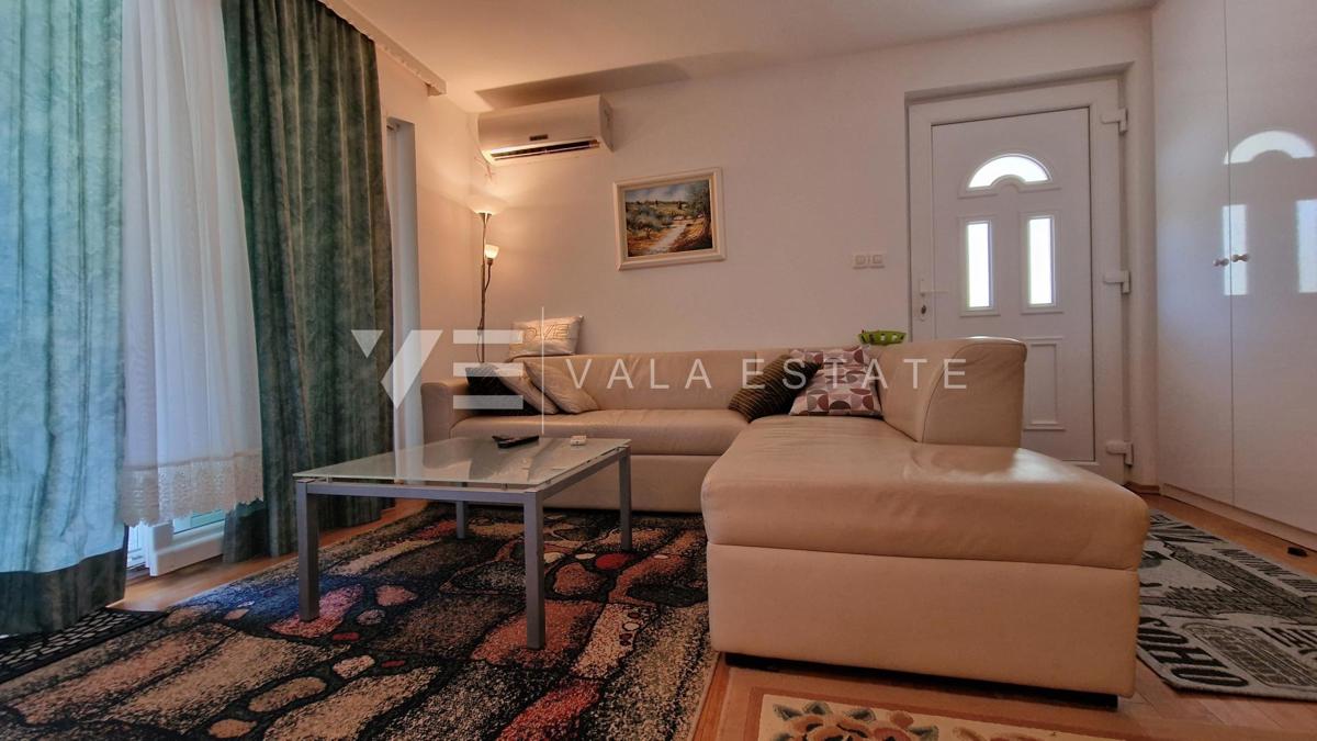 APPARTAMENTO CON DUE CAMERE DA LETTO AL PIANO TERRA CON GIARDINO IN POSIZIONE ATTRAENTE