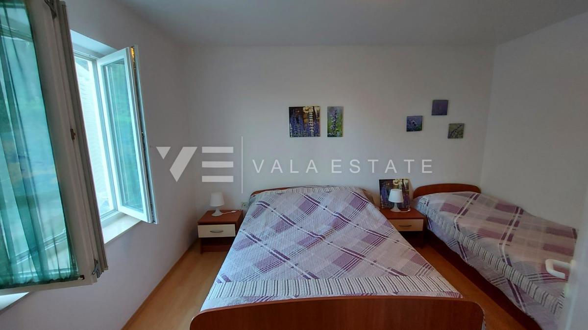 CASA UNIFAMILIARE CON QUATTRO APPARTAMENTI E VISTA MARE