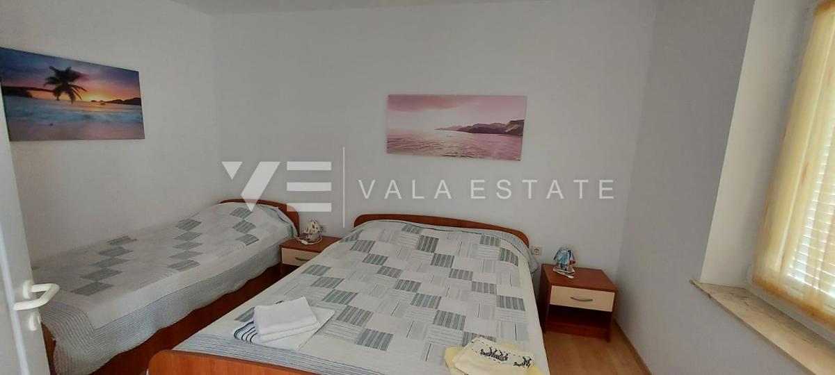 CASA UNIFAMILIARE CON QUATTRO APPARTAMENTI E VISTA MARE